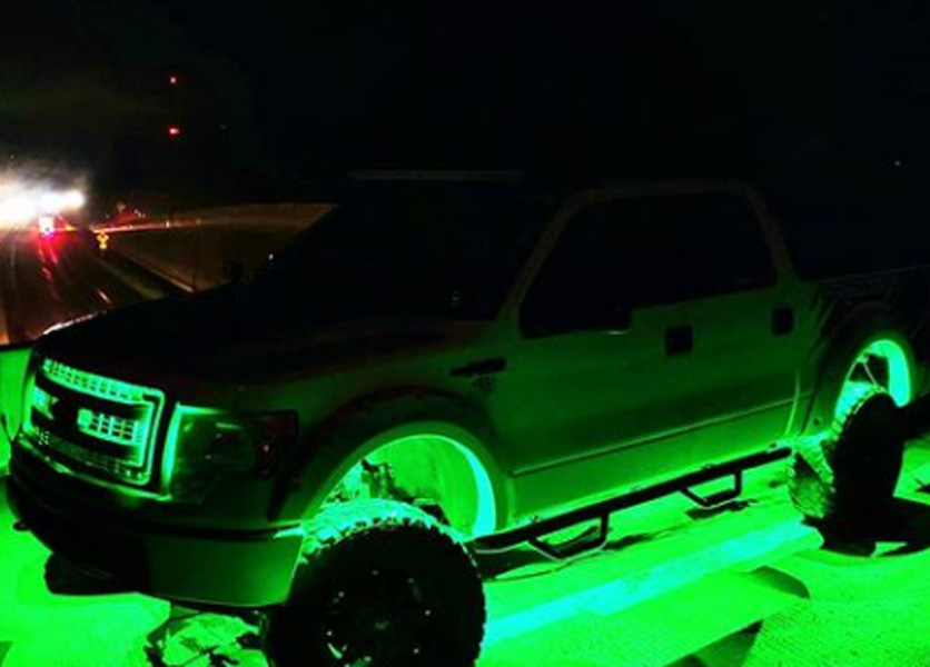 truck underneath lights